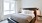 a bed with a large window